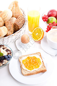 早餐桌加吐司和橘子马瓜 与世隔绝咖啡厨房食物饮料果汁面包橙子盘子杯子桌子图片