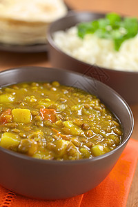 冷冻咖喱土豆食物蔬菜美食煎饼扁豆盘子豆类脉冲午餐图片