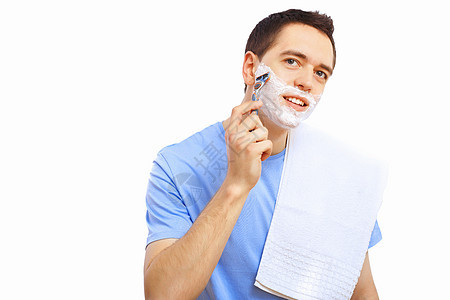 家里的年轻人刮胡子男人刮胡子刀刃镜子男性剃须微笑胡须泡沫剃须膏图片