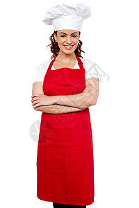 女厨师用手站在十字路口食谱餐饮女士面包师商业帽子双臂餐厅食物职业图片