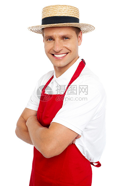 笑笑英俊厨师的轻松肖像餐厅职业商业餐饮双臂面包师食物帽子服务男人图片