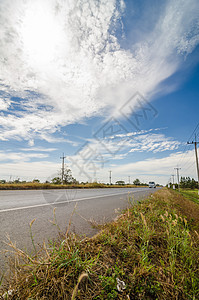 古城的公路风景城市天空国家太阳蓝色运输场景旅行路线图片