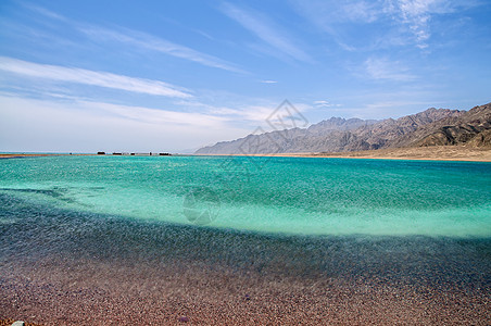 美丽的环礁湖风景棚户区气候天空阳光蓝色海岸线热带孤独海景图片