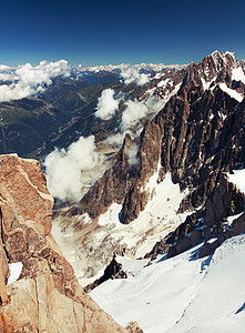 阿尔卑斯山石头岩石太阳顶峰风景地块场景天空冰川蓝色图片