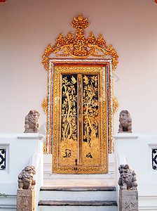 泰国传统风格的大门寺庙信仰历史手工框架雕塑宗教保佑精神艺术旅行图片
