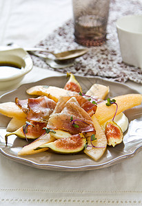 Fig Melon与Prosciutto和合著营养小吃食物敷料水果蔬菜美味美食火腿饮食图片
