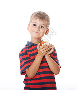 男孩拿着苹果食物飓风童年眼睛孩子快乐享受乐趣水果白色图片