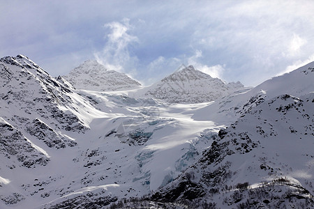 山山脉旅行远足冻结闲暇阳光晴天山峰爬坡冰川太阳图片