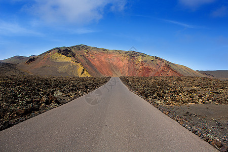 火灾山路蓝色国家旅游观光火地岩石石头土壤晴天假期图片