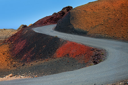 火灾山路干旱观光天空晴天国家蓝色火山火地旅行石头图片