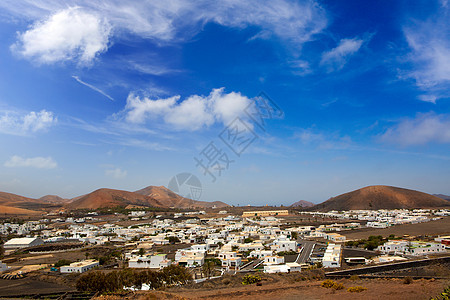 白人住宅村山脉房屋城市粉饰地标火山村庄环境棕榈干旱图片