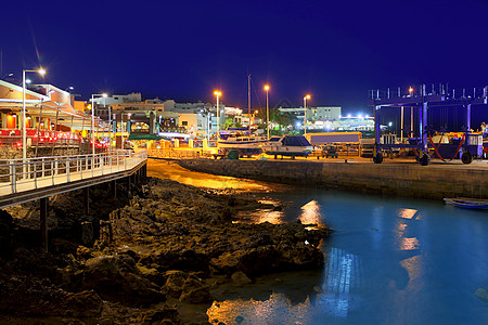 兰萨罗特卡门港港口夜景旅行卡门假期日出反射蓝色帆船地标建筑村庄图片