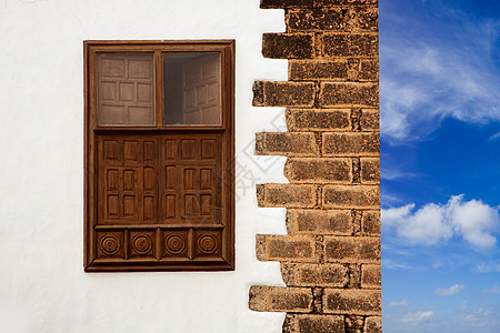 加那利群岛的白人村庄街道房地产住房房屋装饰石头火山城市风格干旱图片