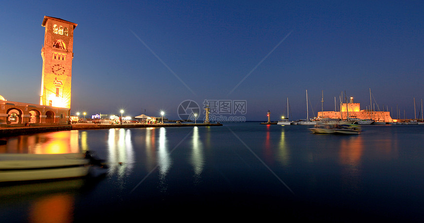 日落时罗得希腊天空文化日出雕像港口反射历史地标地平线纪念碑图片