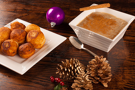 圣诞美食圣诞食圆形肉桂油炸拉丁季节性馒头盘子服务包子糕点背景