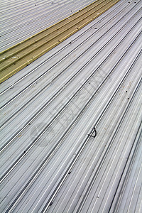 以钢铁制成的屋顶技术脚手架材料波纹建造边界盘子瓦楞蓝色床单图片