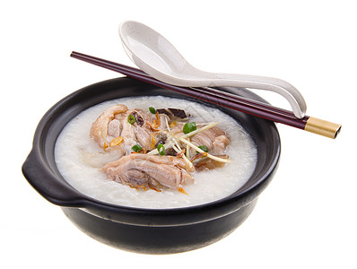泥锅里用过传统的中国粥粥水稻汁文化早餐午餐猪肉食物蔬菜稀饭餐厅水平图片