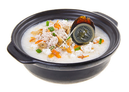 传统的中华世纪鸡蛋和猪肉粥炒饭猪肉饮食美食稀饭鸭蛋勺子鸭子食物烹饪盘子图片