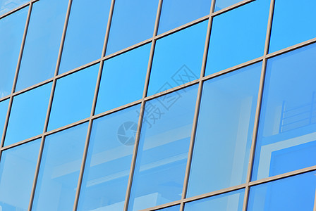 视窗阳光民众玻璃反射摩天大楼窗户金融条纹镜像蓝色图片