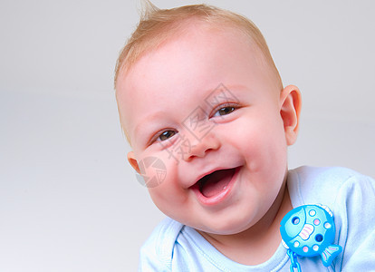 可爱的宝贝男孩笑牙齿牙科微笑儿童牛奶孩子尿布教育婴儿餐巾图片