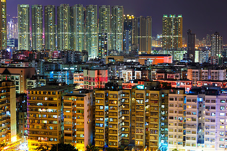 香港城市夜间建筑办公室日落商业摩天大楼旅行玻璃地标景观反射图片