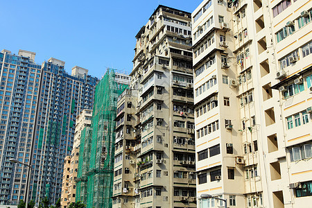 香港拥挤的大楼城市窗帘高楼窗户生活建筑学住房百叶窗天空多层图片