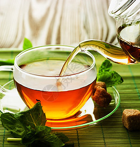 草药茶饮料液体杯子茶壶植物药品桌子蒸汽食物仪式图片