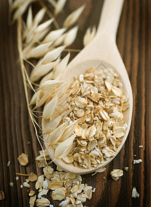 Oat 花粉种子白色薄片勺子植物玉米宏观农民燕麦谷物图片