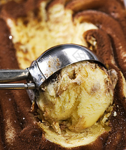 含巧克力和焦糖的冰奶勺奶油餐厅香草宏观冰淇淋菜单甜点营养味道咖啡图片