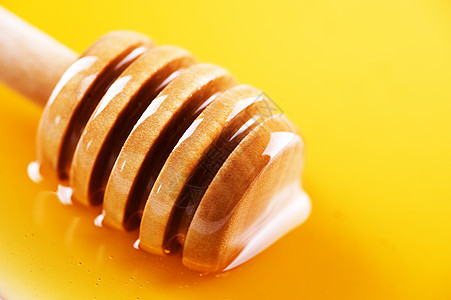 亲爱的食物芳香木头蜜蜂产品菜单蜂蜜液体勺子饮食图片