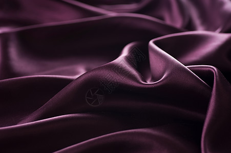 黑暗丝绸背景折叠桌面紫色投标风格装饰布料纺织品宏观海浪图片