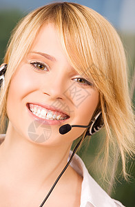 帮助热线办公室技术工人助手快乐微笑服务台顾问手机女性图片