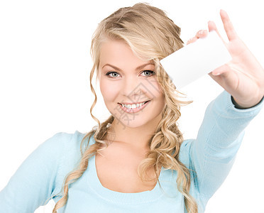 拥有名片的快乐女孩空白卡片商业白色微笑广告蓝色金发女郎女性人士图片