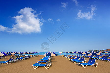 南特内里夫的Adeje Arona海滩天空吊床阳伞观光热带环境地标旅行蓝色图片