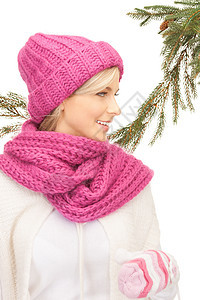 戴冬帽的美女头发女孩微笑羊毛围巾快乐手套季节棉被毛衣图片
