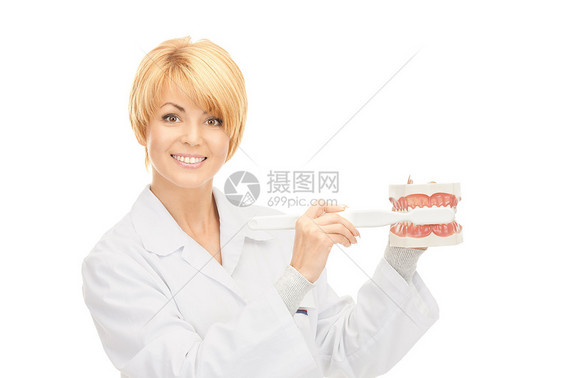有牙刷和下巴的医生刷子口腔科愈合中年治疗牙医牙科专家牙疼药品图片