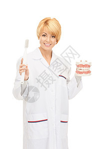 有牙刷和下巴的医生专家保健刷子教学女士中年女性搪瓷打扫牙医图片