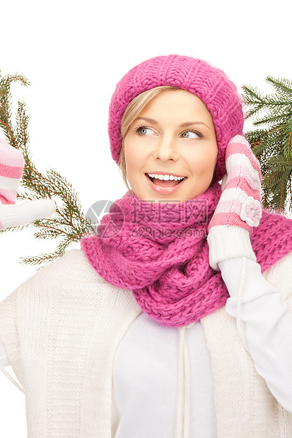 戴冬帽的美女快乐季节帽子头发棉被羊毛毛衣女孩围巾女性图片