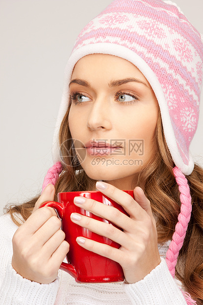 红脸的美女女性头发福利女孩杯子季节饮料帽子成人图片