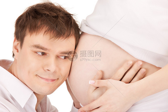 男性和孕妇的腹部检查分娩女士女性父亲微笑夫妻保健爸爸肚子图片