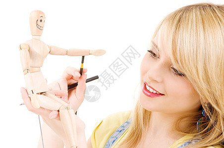 快乐的少女女孩与木模假木模特女性画家学生人体刷子木偶解剖学棕色艺术娃娃图片