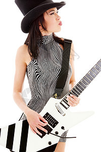 摇滚宝贝玩家女性吉他手艺人岩石裙子姿势音乐家女孩黑发图片