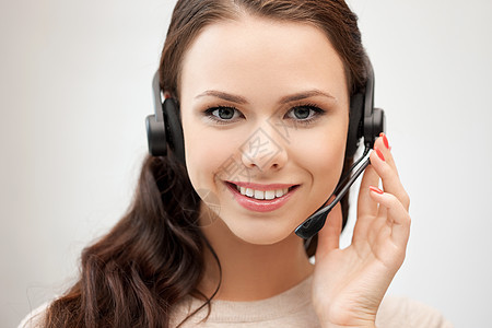 帮助热线办公室女性服务台快乐求助工人耳机技术接待员微笑图片