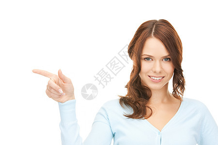 女商务人士指着她的手指公告成人行动警报快乐工作室商业手臂女性微笑图片