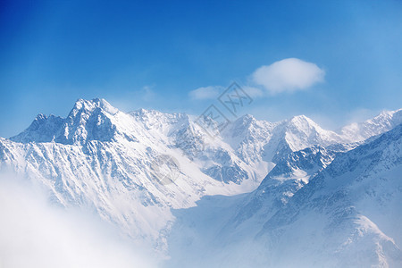 平面顶部运动远足高山太阳暴风雪季节爬坡旅行天空阳光图片