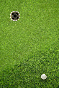 字段上的高尔夫球洞运动推杆绿色高尔夫球课程游戏图片