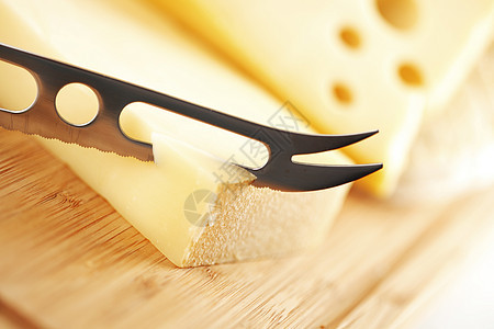 奶酪和奶酪刀烹饪午餐香味奶制品食品生活牛奶美食木头小吃图片
