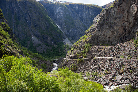 挪威的河流和瀑布山脉树木游客峡湾目的地荒野文化天空旅游森林图片