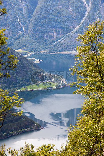 照片来自挪威目的地蓝色瀑布天空荒野峡湾山脉旅游树木景观图片