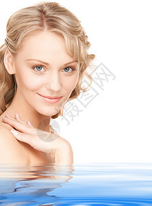美丽美丽的妇女青年温泉卫生头发微笑容貌蓝色福利护理皮肤图片
